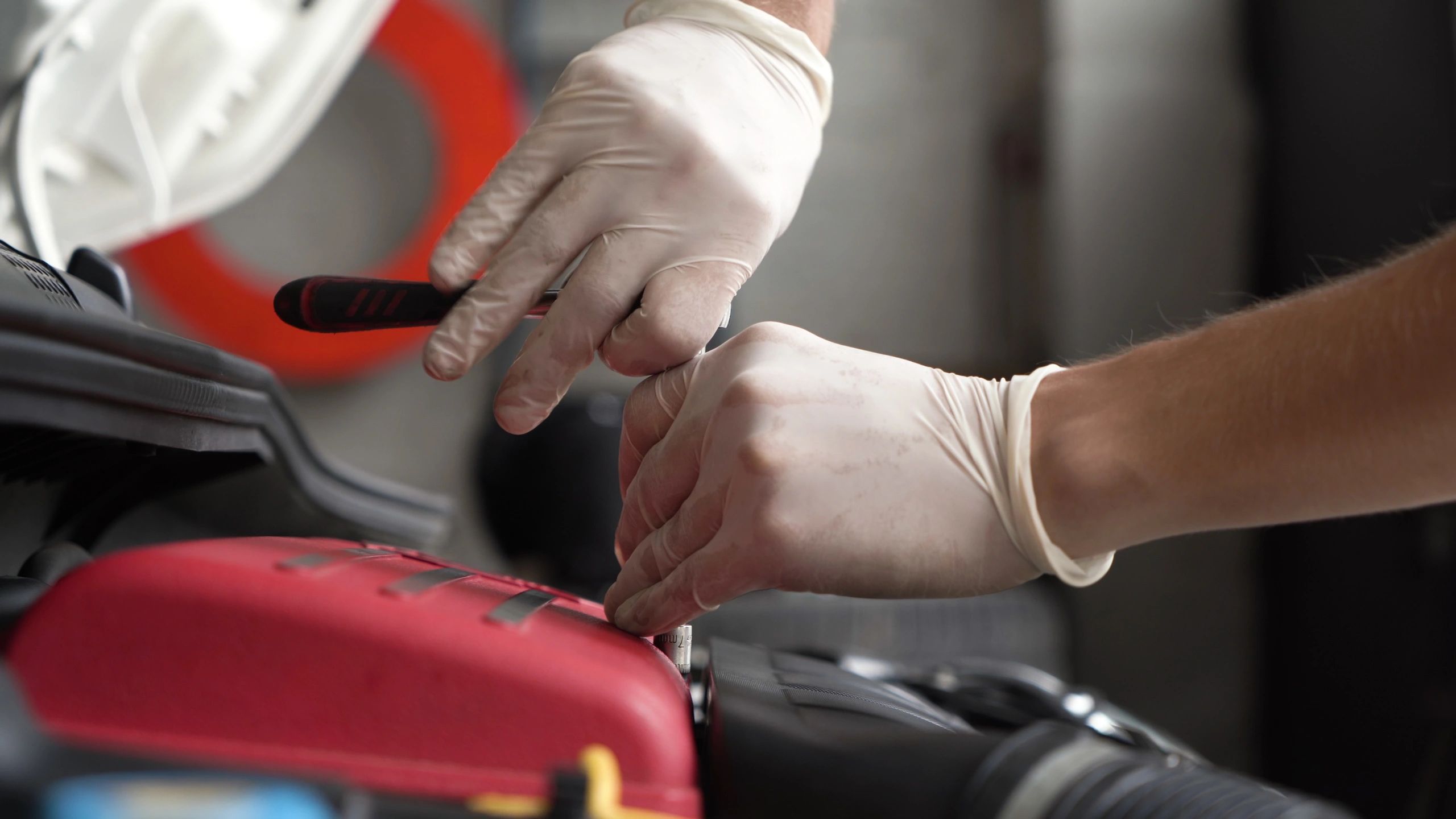 Diesel mechanic performing engine diagnostics with a scan tool